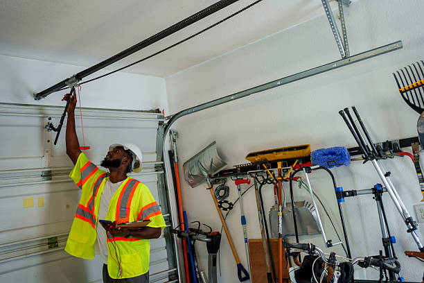 Professional Garage Door Panel Replacement technician working in Athens, IL